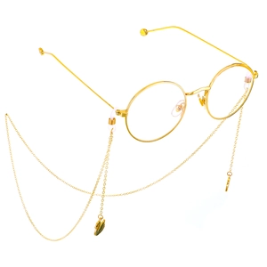 Golden round frame glasses with elegant swan pendant chain accessory on white background