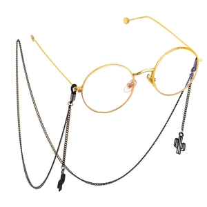 Chic gold round frame glasses featuring a black chain with stylish cactus pendants