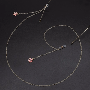 Chaîne de lunettes dorée avec pendentif fleur de cerisier en perle et boucles silicone
