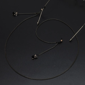 Fashionable black and gold eyewear chain featuring crystal flower charms for sunglasses