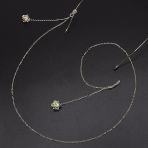 Elegant gold glasses chain with sparkling zircon flower pendants and non-slip silicone loops