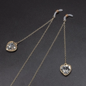 Gouden brillenkoord met kristallen hart hanger en antislip siliconen connectoren