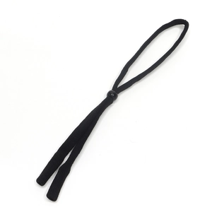 Close-up of black elastic eyeglass cord with adjustable bead and braided texture