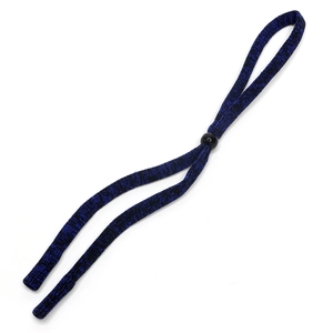 Detail of blue and black braided eyewear strap with adjustable plastic slider and heat-shrink ends