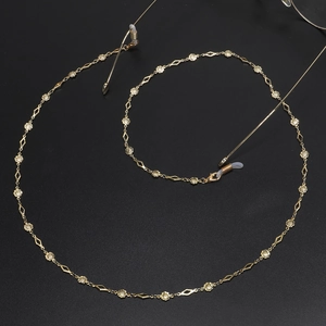 Handmade gold chain for glasses featuring elegant flower and rhombus patterns
