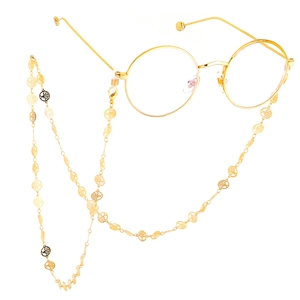 Chaîne de lunettes Arbre de Vie en cuivre faite main avec lunettes dorées sur fond blanc