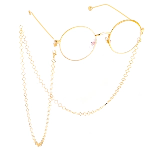 Lunettes rondes dorées avec chaîne à maillons carrés géométriques au design minimaliste