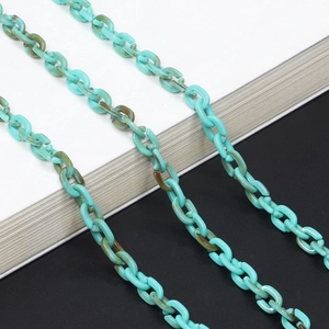 Blue acrylic eyewear chain with tortoise shell pattern links and resin texture