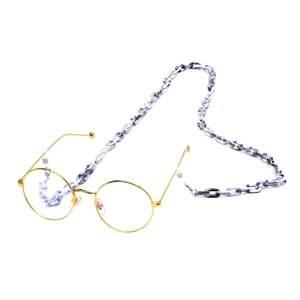 Golden round glasses with black and white marble acrylic link chain for eyewear accessory