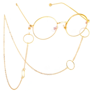 Retro gold metal round frame glasses featuring a decorative geometric ring eyewear chain