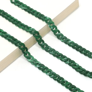 Detail of dark green marble acrylic glasses chain with flat oval links for stylish eyewear