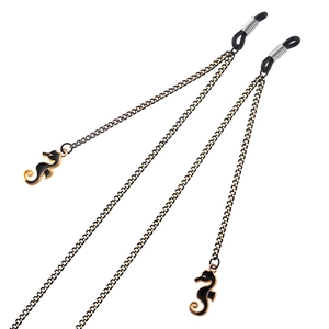 Fashionable eyewear chain with black seahorse pendants and gold metal links