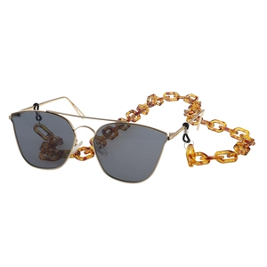 Fashionable tortoise shell acrylic glasses chain with metal frame sunglasses on white background