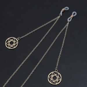 Catenina per occhiali in metallo dorato con asole antiscivolo e ciondoli mandala geometrici