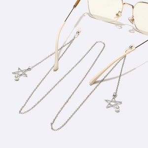Silver metal eyewear chain with star pendant and white pearl accents on white background