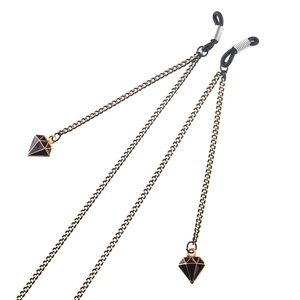 Minimalist black and gold eyewear chain with geometric pendants and rubber loops