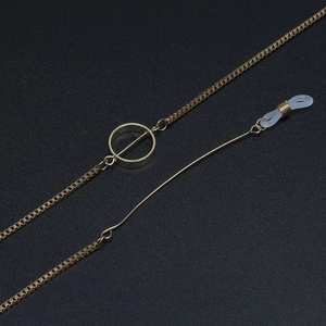 Stylish gold box chain eyewear strap with geometric ring and non-slip silicone loops