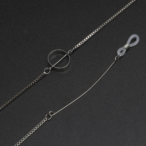 Silver metal box chain eyewear strap with round geometric pendant and anti-slip ends