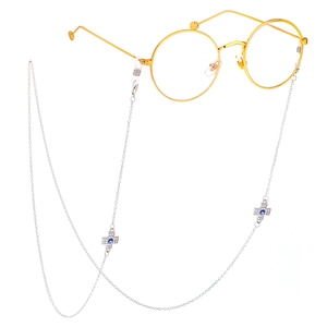 Chaîne de lunettes en métal argenté avec croix en strass et pendentifs œil de démon