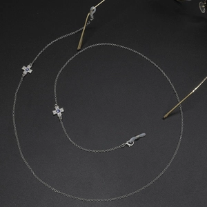 Chaîne de lunettes en métal argenté avec croix en strass et pendentif œil de protection
