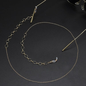 Elegant gold metal glasses chain with geometric links and non-slip rubber loops
