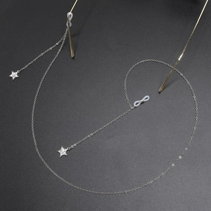 Silver metal eyewear chain with rhinestone star pendants and anti-slip silicone loops