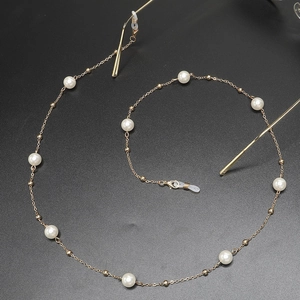 Elegant gold metal eyewear chain with white pearls and anti-slip silicone loops