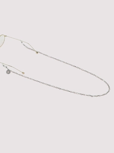 Detail of silver glasses chain with tree of life charm and non-slip rubber connectors