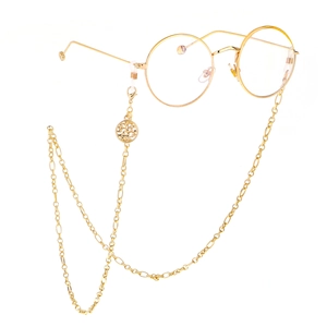 Golden Tree of Life eyewear chain with round metallic glasses on white background