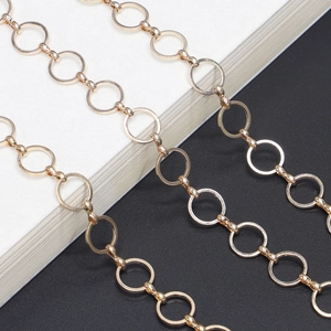 Modern gold-plated round link chain for eyeglasses and fashion accessories on black background