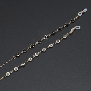 Handmade gold eyewear chains with black and clear glass beads for reading glasses