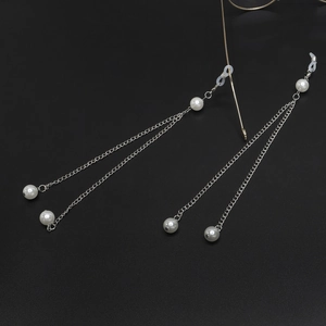 Elegant silver pearl glasses chain necklace with double buckles on black background