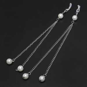 Detail of silver double-strand eyeglass chains with white pearls and lobster clasps