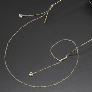 Golden anti-slip eyewear chain featuring delicate flower pendants with zircon stones