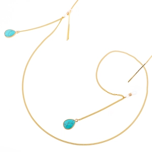 Gold plated stainless steel eyewear chain featuring turquoise waterdrop pendants on white back