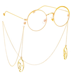 Round gold frame glasses featuring a delicate metal chain with abstract face charms