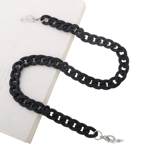 Detail of chunky black acrylic glasses chain with silver lobster clasps and silicone loops