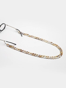 Détail de la chaîne de lunettes en acrylique léopard avec boucles en caoutchouc réglables