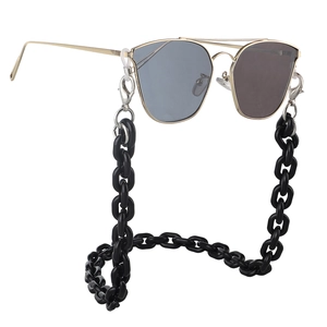 Gold-rimmed sunglasses with black acrylic chunky chain strap in vintage style