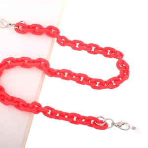 Detail of red acrylic chain links for eyewear with silver lobster clasps and rubber loops
