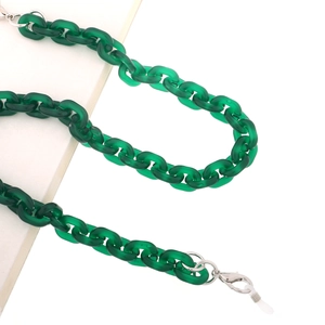 Close-up of green translucent acrylic eyewear chain with silver lobster clasps and silicone loops