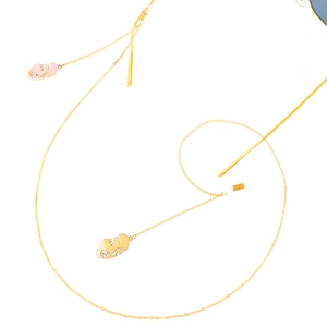 Golden metal eyewear chain with unique face silhouette pendant and anti-slip silicone loops
