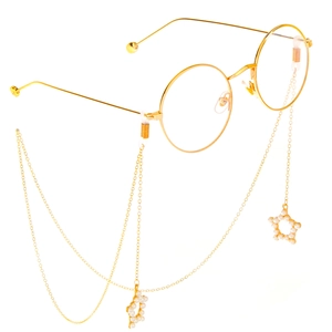 Gold round frame glasses with pearl star pendants and non-slip metal eyewear chain