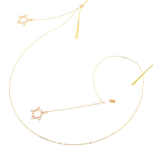 Golden eyewear chain with pearl star pendants and clear silicone anti-slip loops
