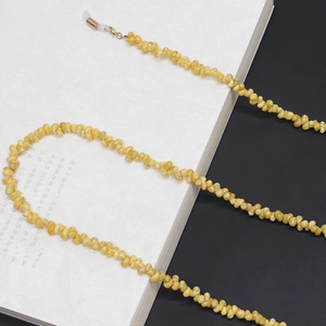 Fashionable gold eyewear chain with yellow conch beads and non-slip silicone loops