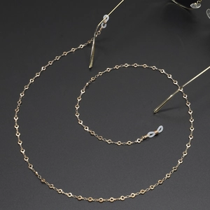Elegant gold metal eyeglasses chain with round links and white silicone loops