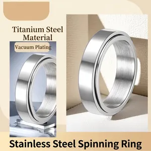 Minimalist stainless steel spinner ring with rotatable brushed center and vacuum plating