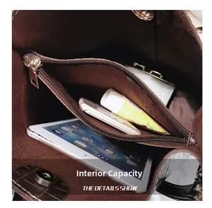 Macro view of the spacious internal storage compartment and durable suede lining
