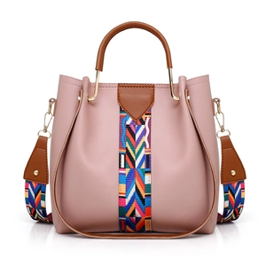 Fashionable pink composite handbag set with colorful bohemian straps and gold hardware