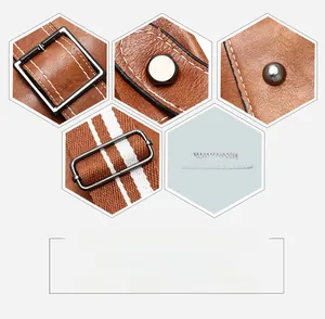 Detail of brown litchi pattern leather with gunmetal hardware and red-white webbing strap